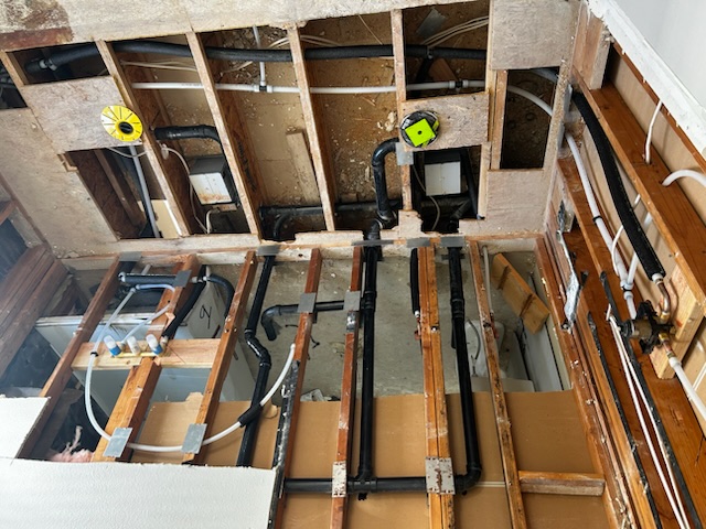 Master bathroom rough-in plumbing remodel in progress by So-Cal Plumbing